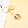 Moda Europea y Americana Nueva Dibujos Animados Gato Mascota Perro Collar Llavero Accesorios para Estudiantes Hombres y Mujeres Fábrica de Origen Ahora