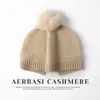 Venta al por mayor de fábrica 100% Cachemir Transfronterizo Otoño/Invierno Nuevo Color Sólido Gorro con Pompón Cálido Versátil Tejido Protección para Orejas Cubre Cabeza Gorro
