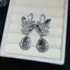 Pendientes colgantes de rombos con borlas tachonados de diamantes de aguja de plata transfronterizos europeos y americanos, pendientes exquisitos y de moda, pendientes versátiles y elegantes al por mayor