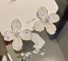 Pinzas para Orejas de Flor de Cristal Transparente con Gradiente Dulce de Primavera, Pendientes para Mujer Frescos y Luminosos, Nuevos Accesorios para Orejas de Temperamento Súper Hada de Moda