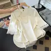 Conjunto de top de seda de estilo chino otoñal, con reducción de edad y calidad garantizada, con tapeta diagonal y detalles de botones, combinado con pantalones de pierna ancha para mujeres de mediana edad