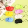 Regalo mayoreo personalidad creativa mini pantuflas colgante de pareja colgante para bolsa de coche simulación zapatos con agujeros llavero