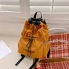 Versión Coreana de la Nueva Mochila con Cordón de Aspecto Elegante para Parejas, Mochila Sencilla para Acampar al Aire Libre, Viajes, Montañismo y Uso Diario