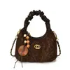 Bolso de mano súper moderno de nicho con estampado de leopardo para mujer, nuevo bolso tote pequeño de moda 2026, bolso tipo empanada, bolso cruzado versátil para el día a día