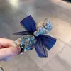 Pasador de Tela Vintage con Bloques de Color, Flores de Cristal, Bolas de Perlas y Lazo, Elegante Accesorio para el Cabello para el Trabajo y el Viaje
