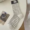 Calcetines de otoño e invierno estilo coreano hasta la pantorrilla para mujer, dulce lazo de encaje, tonos grises de alta gama, calcetines vintage florales apilados hasta la pantorrilla
