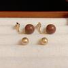 Aretes de perlas marrones simples retro europeos y americanos temperamento femenino dulce alto sentido uso frontal y posterior aretes de perlas aretes