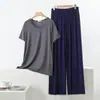 Novo conjunto casual simples de modal para casa, conjunto de duas peças com camiseta de manga curta com amarração e calça pantalona, tamanho grande, corte solto
