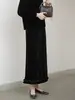 2026 Saia preta de veludo de alta densidade, elegante, rejuvenescedora, versátil e emagrecedora, modelo de um passo com barra franzida, saia midi de veludo