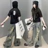 Conjunto de Dos Piezas para Niñas 2026 Verano Nuevo Camiseta de Manga Corta y Jeans Anchos Estilo Americano Desgastados Moderno