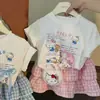 Conjunto de Dos Piezas para Niñas Estilo Coreano Verano Nueva Moda Versátil Dibujos Animados Manga Corta Elegante Dulce Cuadros Falda Corta Cuello Redondo