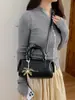 2026 Otoño Nuevo Estilo Coreano Retro Bolso de Hombro de Moda Más Vendido Color Sólido para Viajes Diarios Bolso Cruzado Tipo Cubo