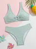 Nuevo traje de baño de dos piezas estilo europeo y americano para niñas, conjunto de bikini de punto de color liso, traje de baño de playa con tiras, traje de baño para niños