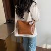 Bolso Bucket Niche para Viajero 2025 Nuevo Bolso Cruzado de Cuero Vintage Encerado al Aceite de Gran Capacidad para Viajero Bolso Tote de Alta Gama