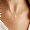 Europa y Estados Unidos venta transfronteriza exquisito collar personalizado de 26 letras moda mujer simple colgante de cobre joyería transfronteriza venta al por mayor