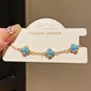 Cadena de Flores Doradas y Azules~Pulsera de Flor de Resina y Zirconia de Lujo Ligero, Pulsera Vintage Electrochapada en Oro Real de 18K, Joyería de Gama Alta de Nicho