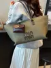 Bolsa de Grande Capacidade para Mulheres no Outono e Inverno, Bolsa de Ombro Simples Versátil 2025, Bolsa Tote Texturizada Popular para o Dia a Dia deste Ano