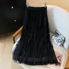 Foto real de uma saia midi de malha reversível para mulheres, outono e inverno, com acabamento em renda, versátil, modeladora, saia plissada estilo fada