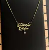 Collar Hueco de Acero Inoxidable con Doble Nombre Estilo Europeo y Americano para Mujer, Colgante de Acero de Titanio con Diamantes Blancos Diseño Personalizado DIY