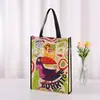 Bolsa Tote de Tecido Não Tecido Laminado Estampado Exclusivo para Halloween Transfronteiriça com Fundo e Laterais Apresentando Caveiras e Abóboras