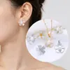 Novos brincos de concha de pérola com moinho de vento de flor de ameixa, moda de comércio exterior e-commerce transfronteiriço Amazon atacado de fábrica