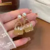 Aretes "Fortuna" Cesta Perla Circonita para Mujer 2026 Nuevos de Gama Alta Lujo Ligero Nicho Accesorios de Oreja de Perla Versátiles