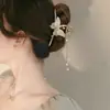 Pinza de garra grande estilo vintage elegante con borla, lirio del valle y espiga de trigo para sujetar el cabello en la parte posterior de la cabeza