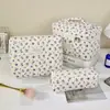 Bolso de maquillaje acolchado floral morado de moda, gran capacidad, portátil, organizador de cosméticos elegante y neceser de viaje de alta calidad