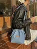 Bolso bandolera de mezclilla vintage casual comercio exterior transfronterizo 2026 nueva moda moderno versátil simple con cordón