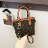 Bolso Cubo Estampado Retro de Comercio Exterior para Mujer 2026 Nuevo Elegante Diseño de Nicho Versátil Bolso de Mano Cruzado de un Solo Hombro