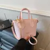Bolso Nicho Ins Estilo Coreano 2026 Primavera Nuevo Bolso de Hombro Cruzado Bolso de Cubo Color Sólido Elegante para Mujer