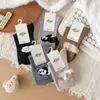 Calcetines de lana cálidos de otoño e invierno hasta la mitad de la pantorrilla, pompones de pelo estéreo, calcetines lindos y adorables para mujer hasta la mitad de la pantorrilla, calcetines gruesos para mujer estilo preppy