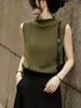 Elegante y chic, este top sin mangas de punto verde oliva de cuello alto es un diseño hermoso para mujeres en otoño, ofreciendo un corte holgado y favorecedor.