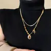 Colar Maillard Outono e Inverno Pedra Olho de Tigre Aço Titânio Feminino Design Coreano de Nicho Corrente Longa para Moletom Acessórios Versátil Novo Estilo