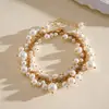 Collar de borla con cuentas de perlas vintage europeo y americano, cadena para la clavícula de nicho de lujo ligero transfronterizo de alta gama, accesorio de moda de Instagram