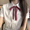 Camisa de corbata JK Estilo Universitario Cuello de uniforme Flor Color sólido Mango largo Accesorios Uniforme escolar para niños Cuello de actuación Lazo