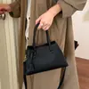 Bolso de mano de alta gama transfronterizo para mujer, nuevo bolso tote retro de moda para el día a día, bolso de hombro y cruzado de gran capacidad, moderno