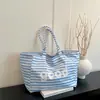 Bolsa de mano tote artística casual de gran capacidad, estilo perezoso, diseño de nicho, con estampado de letras a rayas, de doble cara, para mujer