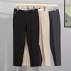 Calças masculinas pretas slim fit calças casuais masculinas moda coreana calças de comprimento no tornozelo bordadas com abelha calças sociais masculinas
