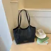 Bolso grande de Shuai Mi Jia para mujer 2026 nuevo bolso de hombro de nicho para el trabajo para estudiantes universitarios que van a clase bolso tote