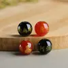 Venta al por mayor del fabricante Cuentas de Ágata Roja y Negra Flor de Loto con Estampado Dorado, Accesorios para Joyería DIY