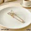 Broche anti-luz broche de perlas de nicho herramienta reductora de talla de cintura botón de pinza de flor para ceñir la cintura pin reductor de talla de jeans