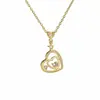 Collar con Colgante de Corazón Hueco Estilo Bohemio para Mujer Transmisión en Vivo Venta Caliente Lujo Ligero Joyería con Sensación de Alta Gama Accesorios para Collar Cadena de Clavícula Venta al por Mayor