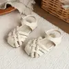 Linda Banda para la Cabeza Zapatos para Niños 2026 Verano Sandalias Tejidas para Niños Sandalias de Niña Estilo Nuevo Suela Suave Antideslizantes Zapatos de Princesa
