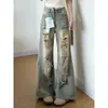 Jeans Rasgados de la Calle Principal Americana para Mujer Otoño Nuevo Estilo Súper Calientes Lavados Vintage Cintura Alta Caída Sueltos Pierna Ancha