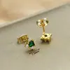 Pendientes mini minimalistas vintage transfronterizos exquisitos con incrustaciones de circonita, con un toque de lujo ligero y alta gama, pendientes al por mayor