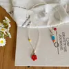 Collar Largo de Flor con Cuentas Dopamina para Mujer Verano 2025 Nuevo Accesorios Halter Nicho Único Cadena Apilada para Clavícula