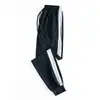 Calça de uniforme para alunos do Ensino Fundamental II e Ensino Médio masculina e feminina fina azul marinho solta com amarração no tornozelo cor sólida combinando calça esportiva casual
