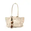Bolso de nicho, bolso tote de moda nuevo para mujer primavera 2025, estilo dulce con cinta y lazo, bolso cruzado