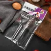 Pelador de acero inoxidable tres piezas rallador multifuncional para el hogar pinza para el pelo de pato cuchillo de fruta pelador melón y fruta Rallador
